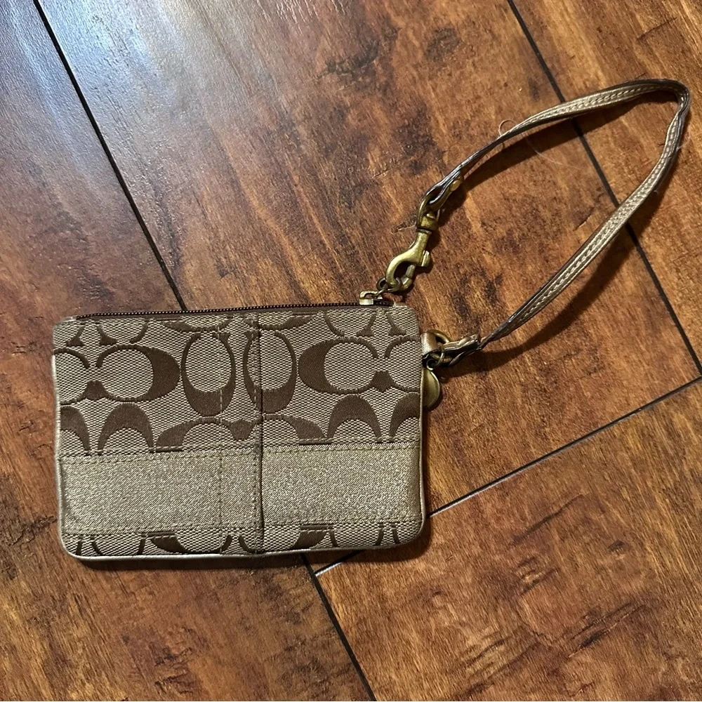 Coach brown and gold sateen horizontal stripe monogram wristlet
